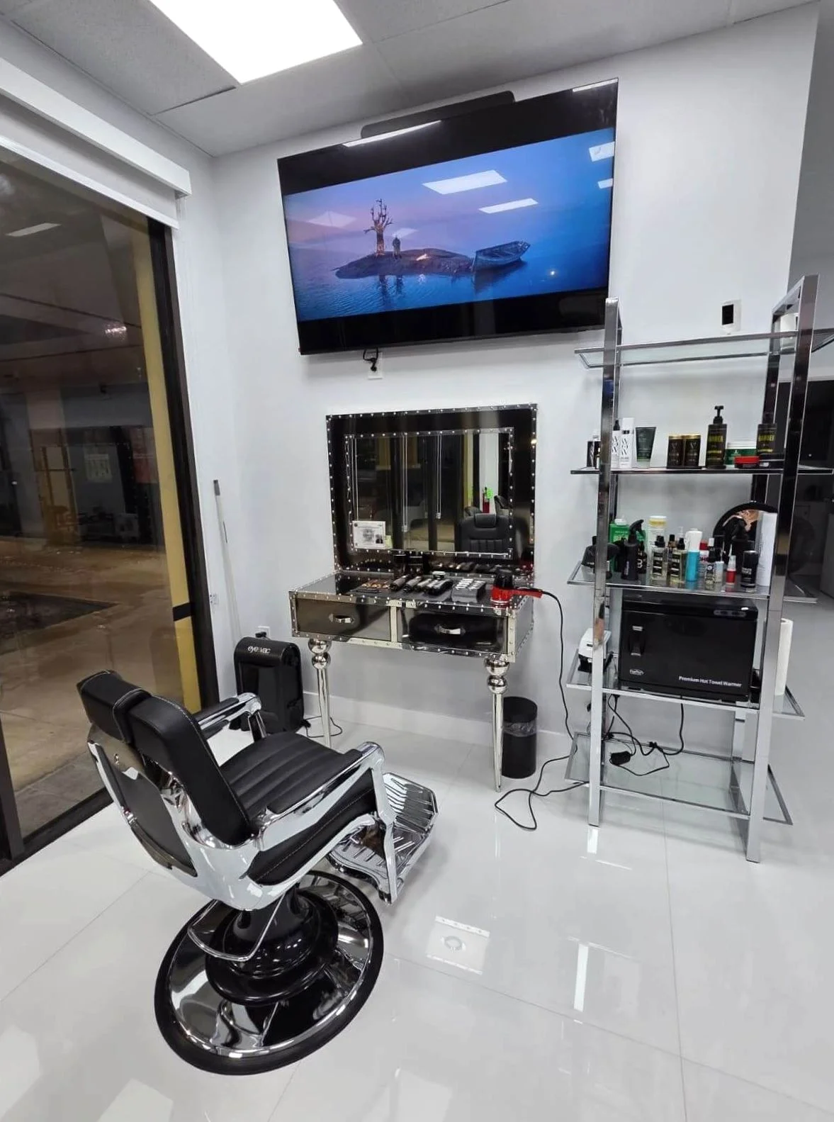 Barber chair, mirrored workstation and professional tools at Victoria Hair Club