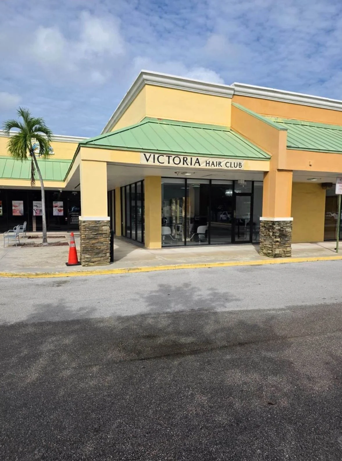 Victoria Hair Club storefront and salon sign in Boca Raton, Florida