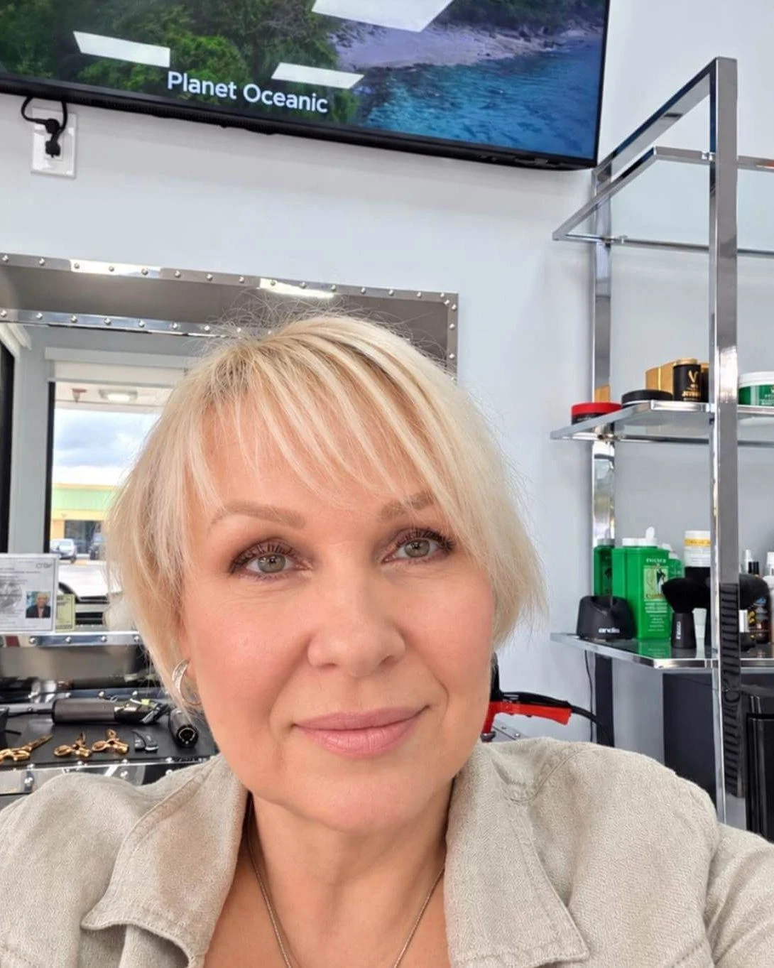 Victoria Ponomarova beside her styling tools and professional hair products